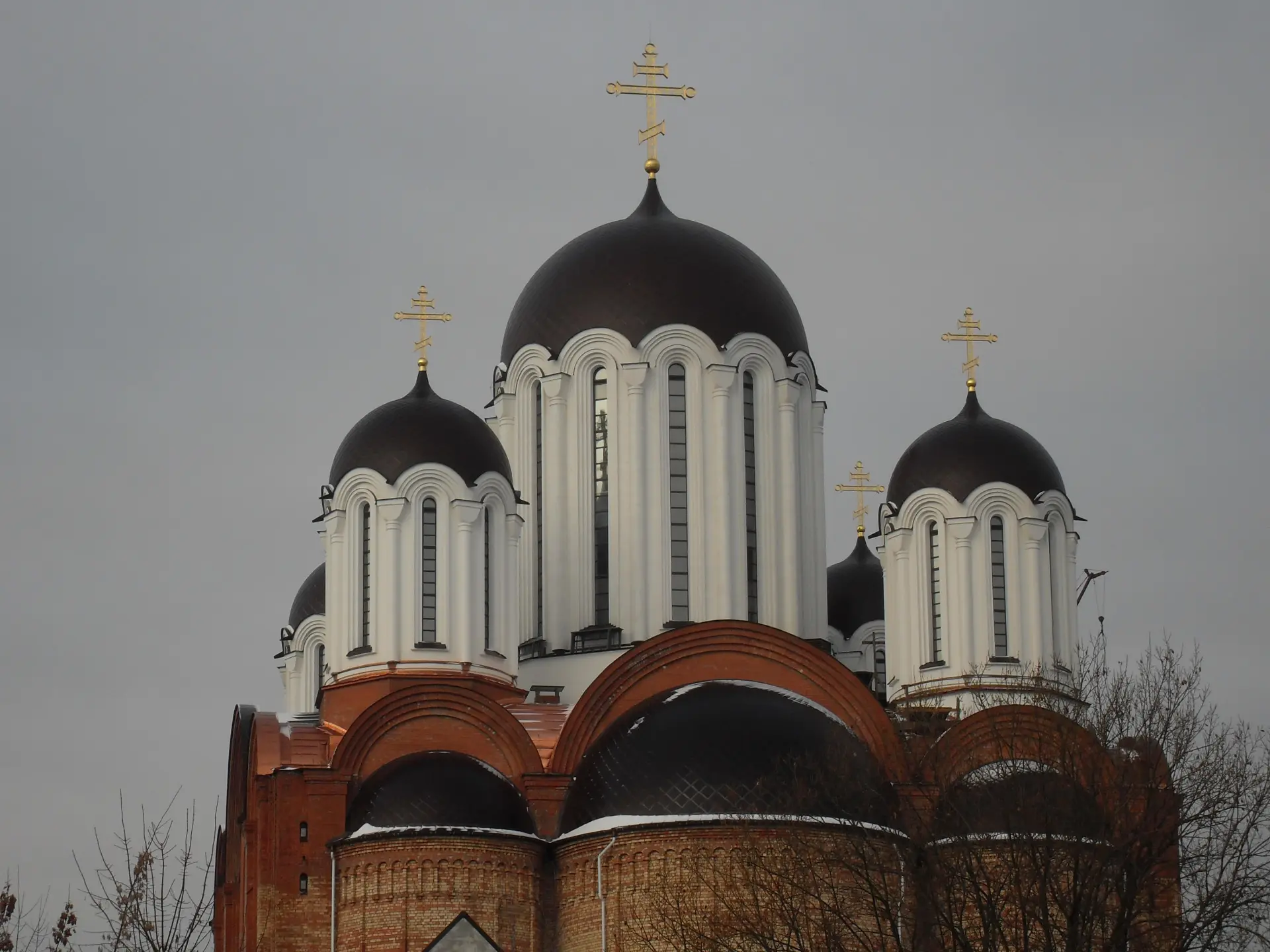 Finished copper onion domes on an Orthodox church